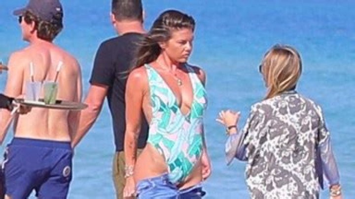 Chanel West Coast Pairs Plunging Swimsuit With Daisy Dukes For A Sexy Beach Look