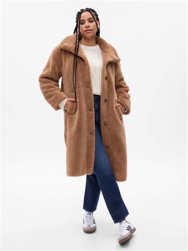 Pregnant Rihanna Rocks Long Sherpa Coat & Camel Boots As She Jokes ‘I Can’t Stand Me’