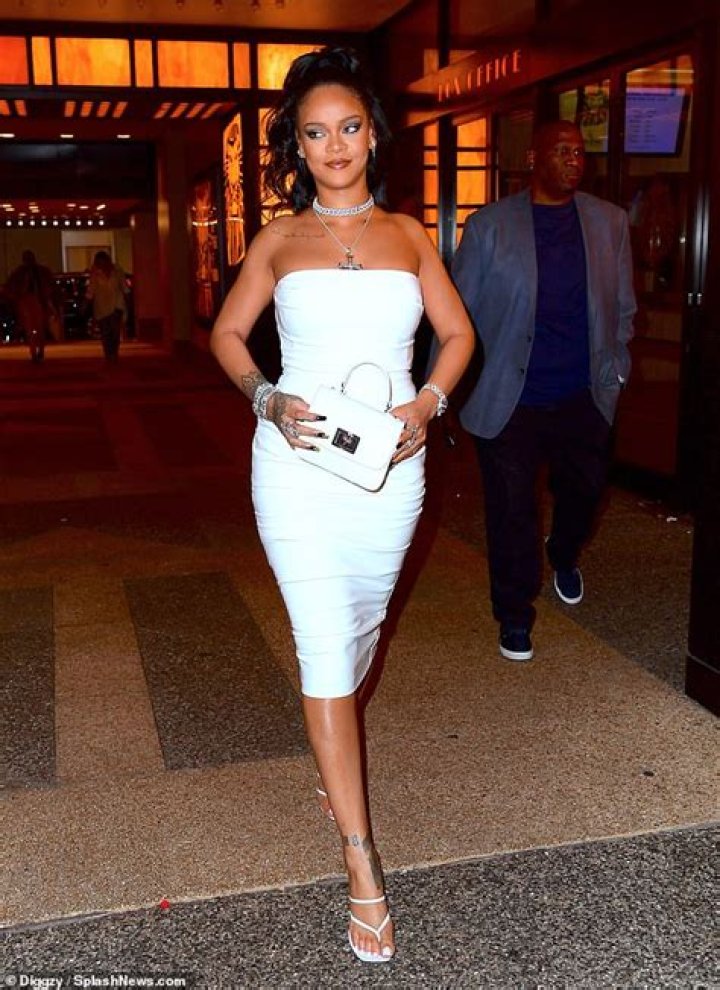 Rihanna Is Dripping In Diamonds In Tight White Midi Dress At 2019 Porcelain Ball In NYC — See Pics
