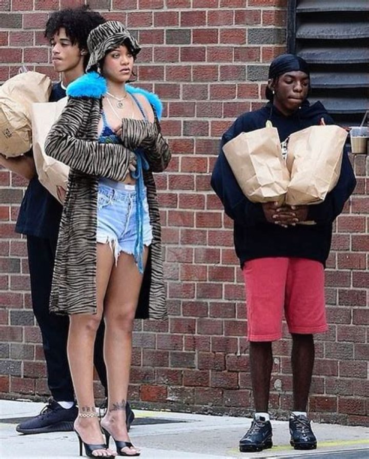 Rihanna Steps Out In Black Mini Dress With Platform Pumps While Shopping In NYC