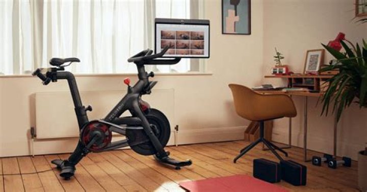 Turn Your Existing Exercise Bike Into A Peloton With This iPad Handlebar Mount That Makes Watching Videos Easy
